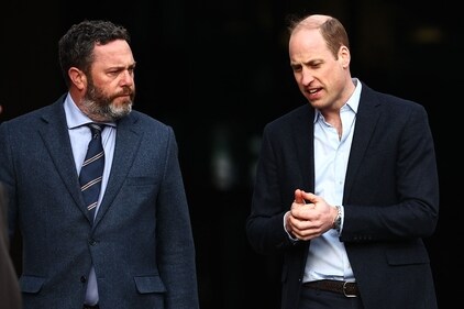 Britain's Prince William, Prince of Wales (R) chats with Surrey CCC chairman Oli Slipper (L) while leaving the Kia Oval cricket ground after meeting with members of Earthshot Prize winner "Notpla" on March 8, 2024, to hear about a new multi-million-pound contract with Levy UK + Ireland, part of Compass Group, to introduce Notpla's seaweed-based, natural food packaging to over 50 sporting and event venues. (Photo by HENRY NICHOLLS / AFP) (AFP)
