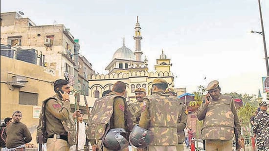 Police personnel deployed outside the masjid at Inderlok on Friday. (HT Photo)