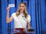 Lara Trump, the newly-elected co-chair of the Republican National Committee, holds up a donation check as she gives an address during the general session of the RNC Spring Meeting Friday, March 8, 2024, in Houston. (AP Photo/Michael Wyke) Lara Trump, the newly-elected co-chair of the Republican National Committee, holds up a donation check as she gives an address during the general session of the RNC Spring Meeting Friday, March 8, 2024, in Houston. (AP Photo/Michael Wyke)