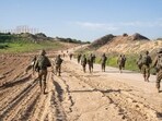 This handout picture released by the Israeli army shows troops on the ground in the Gaza Strip, amid ongoing battles between Israel and the Palestinian militant group Hamas. This handout picture released by the Israeli army shows troops on the ground in the Gaza Strip, amid ongoing battles between Israel and the Palestinian militant group Hamas.