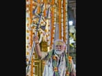 Prime Minister Narendra Modi picked up a 'trishul' and greeted the public while holding it in his hand after offering prayers at the famous Kashi Vishwanath Temple in Varanasi on Saturday.