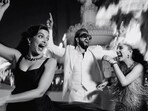 Deepika Padukone and Ranveer Singh dance with Radhika Merchant at her pre-wedding celebrations in Jamnagar. Deepika Padukone and Ranveer Singh dance with Radhika Merchant at her pre-wedding celebrations in Jamnagar.