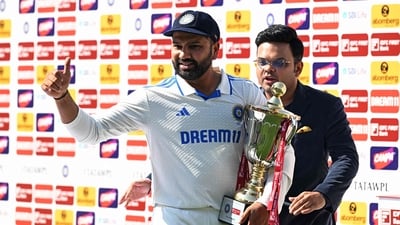 Captain Rohit Sharma (L) holds the trophy after winning the fifth and last Test cricket match between India and England (AFP) Captain Rohit Sharma (L) holds the trophy after winning the fifth and last Test cricket match between India and England (AFP)