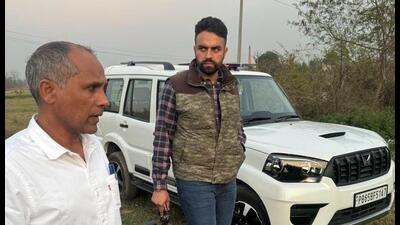 DSP Gursher Singh Sandhu and Inspector Shiv Kumar at the encounter spot in Majri, Mohali. (HT File) DSP Gursher Singh Sandhu and Inspector Shiv Kumar at the encounter spot in Majri, Mohali. (HT File)