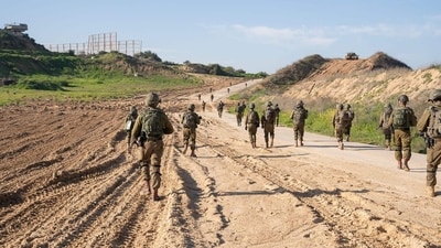 This handout picture released by the Israeli army shows troops on the ground in the Gaza Strip, amid ongoing battles between Israel and the Palestinian militant group Hamas. (AFP) This handout picture released by the Israeli army shows troops on the ground in the Gaza Strip, amid ongoing battles between Israel and the Palestinian militant group Hamas. (AFP)