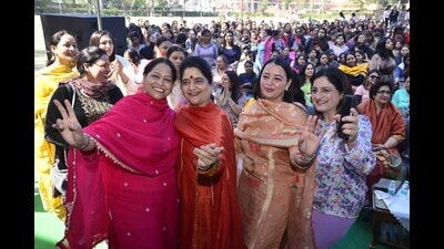 KCW alumni clicking pictures during a meet in Ludhiana on Saturday. (HT Photo)