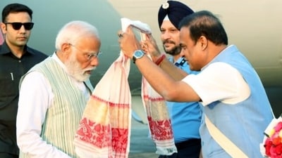PM Narendra Modi welcomed by Assam Chief Minister Himanta Biswa Sarma upon his arrival in Tezpur on Friday. (PTI)