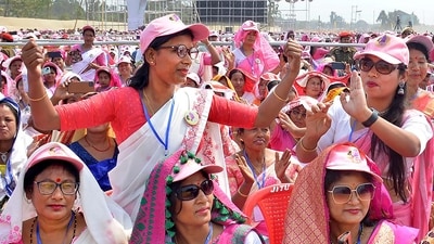 People attend a programme addressed by PM Narendra Modi in Jorhat district of Assam on Saturday. (PTI)