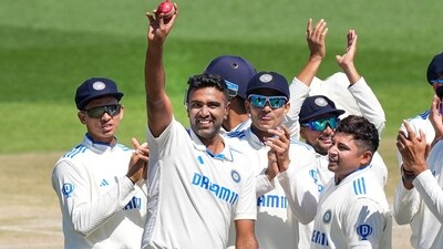 India's R Ashwin shows the ball as he takes a five-wicket haul during the 3rd day of the fifth Test cricket match between India and England, in Dharamsala, Satutday, March 9 (PTI) India's R Ashwin shows the ball as he takes a five-wicket haul during the 3rd day of the fifth Test cricket match between India and England, in Dharamsala, Satutday, March 9 (PTI)