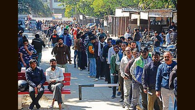 People queueing up outside the court to fill e-challans in the Lok Adalat in Panchkula on Saturday. (HT PHOTO)