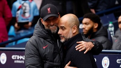 Manchester City manager Pep Guardiola with Liverpool manager Juergen Klopp before the match (Reuters)