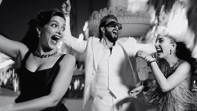Deepika Padukone and Ranveer Singh dance with Radhika Merchant at her pre-wedding celebrations in Jamnagar. Deepika Padukone and Ranveer Singh dance with Radhika Merchant at her pre-wedding celebrations in Jamnagar.
