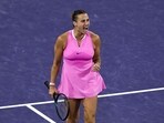 Aryna Sabalenka celebrates after a point.