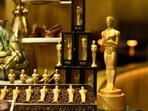 Golden chocolate Oscars are displayed during the 96th Oscars Governors Ball preview at the Ray Dolby Ballroom.