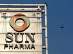 FILE PHOTO: A bird flies past the logo of Sun Pharma installed on the facade of its corporate office in Mumbai, India, November 14, 2017. REUTERS/Shailesh Andrade/File Photo