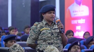A Chhattisgarh Police personnel speaks during her interaction with chief minister Vishnu Deo Sai at an event to mark International Women's Day.