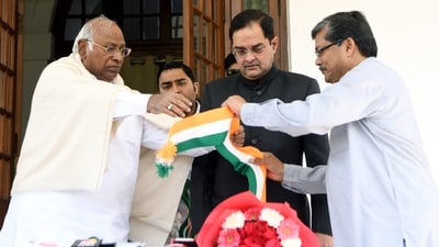 Newly-joined Congress member Brijendra Singh with party president Mallikarjun Kharge and party general secretary Mukul Wasnik, at his residence, in New Delhi on Sunday. (ANI) Newly-joined Congress member Brijendra Singh with party president Mallikarjun Kharge and party general secretary Mukul Wasnik, at his residence, in New Delhi on Sunday. (ANI)