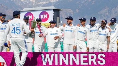 Indian cricket team captian Rohit Sharma (L) with the trohpy come to join teammates for group photo after winning the fifth Test cricket match over England, in Dharamsala, Saturday, March 9 (PTI) Indian cricket team captian Rohit Sharma (L) with the trohpy come to join teammates for group photo after winning the fifth Test cricket match over England, in Dharamsala, Saturday, March 9 (PTI)