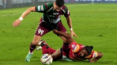 Mohun Bagan Super Giants and East Bengal FC(Red-Yellow) players vie for the ball (PTI) Mohun Bagan Super Giants and East Bengal FC(Red-Yellow) players vie for the ball (PTI)