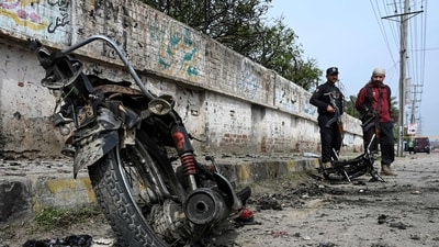 Security personnel examine the site of a blast in Peshawar district of the Khyber Pakhtunkhwa on March 10. (AFP) Security personnel examine the site of a blast in Peshawar district of the Khyber Pakhtunkhwa on March 10. (AFP)
