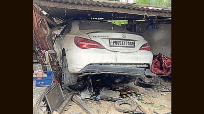 The car at the crash site near Cheema Boilers in Phase 8-B, Mohali, on Sunday. (HT Photo)