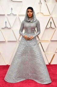 Janelle Monáe stuns in the red carpet of 92nd annual Academy Awards in silver hooded gown. (Getty images) Janelle Monáe stuns in the red carpet of 92nd annual Academy Awards in silver hooded gown. (Getty images)