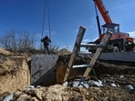 Workers built a concrete dugout as part of a system of new fortifications, amid Russia's attack on Ukraine, in Zaporizhzhia region.