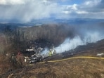 Emergency crew work at the site of a business jet crash in Hot Springs, Bath County, Virginia, U.S. March 10, 2024