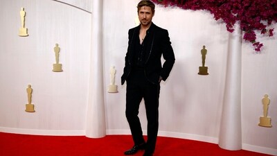 Barbie star Ryan Gosling is definitely one of the best-dressed men on the Oscars red carpet. The actor looked absolutely dapper in a bespoke Gucci pantsuit featuring a black blazer with a shimmering lining, an open buttoned black shirt and well-fitted trousers. With his perfectly groomed beard and charming smile, he is sure to win your heart. (REUTERS)