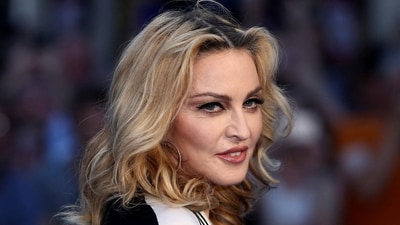 Madonna scolded a fan for sitting down during a concert only to notice a wheelchair (REUTERS/Neil Hall/File Photo) (REUTERS)