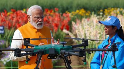 Prime Minister Narendra Modi witnesses agricultural drone demonstration by 'Namo Drone Didis' at the Indian Agricultural Reseach Institute in New Delhi on Monday. (PMO) Prime Minister Narendra Modi witnesses agricultural drone demonstration by 'Namo Drone Didis' at the Indian Agricultural Reseach Institute in New Delhi on Monday. (PMO)