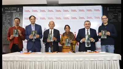 Shoolini University chancellor Prem Kumar Khosla launching his autobiography “Eighty-Four Memoirs” at the Chandigarh Press Club. (HT Photo)