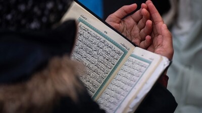 Members of the Muslim community gather for the first Taraweeh prayer of Ramadan in Times Square, New York City, on March 10. (AFP)
