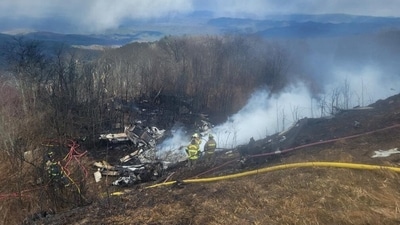 Emergency crew work at the site of a business jet crash in Hot Springs, Bath County, Virginia, U.S. March 10, 2024 (via REUTERS)