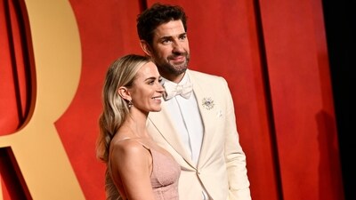 Emily Blunt, left, and John Krasinski arrive at the Vanity Fair Oscar Party. Emily was nominated in Best Supporting Actress category but lost to Da'Vine Joy Randolph. (Evan Agostini/Invision/AP)