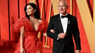 Lauren Sanchez, left, and Jeff Bezos arrive at the Vanity Fair Oscar Party. It was not the best year for streamers, including Bezos' Prime Video. While Universal and Disney’s Searchlight scored with Oppenheimer and Poor Things, respectively, Netflix Inc. won only for a film short and Apple was shut out. Amazon.com Inc.’s MGM distributed American Fiction, winner of best adapted screenplay. (Evan Agostini/Invision/AP)