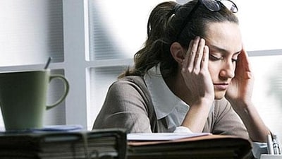 Schedule worry breaks: Rather than trying to suppress anxious thoughts entirely, set aside specific 'worry time' to feel them fully, then re-focus. This provides an outlet while reclaiming control. (Shutterstock) Schedule worry breaks: Rather than trying to suppress anxious thoughts entirely, set aside specific 'worry time' to feel them fully, then re-focus. This provides an outlet while reclaiming control. (Shutterstock)