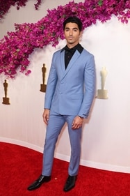 Taylor Zakhar Perez In a powder blue Prada suit juxtaposed with stark black accent (Photo: AFP) Taylor Zakhar Perez In a powder blue Prada suit juxtaposed with stark black accent (Photo: AFP)
