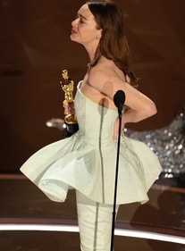 Emma Stone in a custom Louis Vuitton pale mint peplum gown (Photo: AFP) Emma Stone in a custom Louis Vuitton pale mint peplum gown (Photo: AFP)