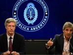 Argentina Economy Minister Luis Caputo (R), accompanied by the President of the Central Bank of Argentina Santiago Bausili (L), speaks during a press conference. Argentina Economy Minister Luis Caputo (R), accompanied by the President of the Central Bank of Argentina Santiago Bausili (L), speaks during a press conference.