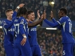 Chelsea's Nicolas Jackson celebrates with teammates after scoring his side's opening goal during the English Premier League match vs Newcastle