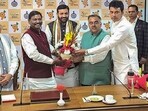 Haryana BJP President and OBC leader Nayab Singh Saini being greeted by senior party leaders Arjun Munda, Biplab Kumar Deb, former CM Manohar Lal and others after he was chosen as the next chief minister, Haryana BJP President and OBC leader Nayab Singh Saini being greeted by senior party leaders Arjun Munda, Biplab Kumar Deb, former CM Manohar Lal and others after he was chosen as the next chief minister,