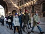 Swedish climate activist Greta Thunberg (C) and fellow activists make their way to block the main entrances of the Swedish Parliament during a protest due to the lack of action from the Swedish authorities, on March 11, 2024, in Stockholm, Sweden. 