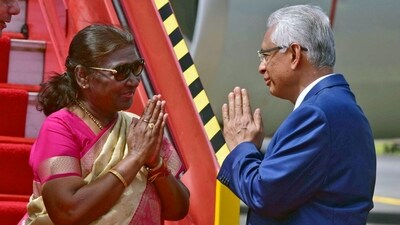 President Droupadi Murmu being welcomed by Mauritius Prime Minister Pravind Kumar Jugnauth on her arrival for her first state visit to the country, on Monday. She will participate in the Mauritian National Day celebrations as the chief guest. (X/@MEAIndia) President Droupadi Murmu being welcomed by Mauritius Prime Minister Pravind Kumar Jugnauth on her arrival for her first state visit to the country, on Monday. She will participate in the Mauritian National Day celebrations as the chief guest. (X/@MEAIndia)