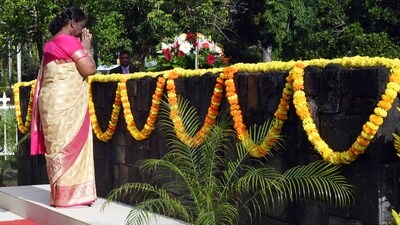 President Droupadi Murmu pays homage to former Mauritius Prime Ministers Seewoosagur Ramgoolam and Anerood Jugnauth during a wreath-laying ceremony at the Botanical Gardens, in Pamplemousses on Monday. (ANI) President Droupadi Murmu pays homage to former Mauritius Prime Ministers Seewoosagur Ramgoolam and Anerood Jugnauth during a wreath-laying ceremony at the Botanical Gardens, in Pamplemousses on Monday. (ANI)