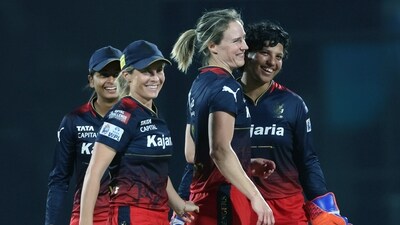 Royal Challengers Bangalore Women's (RCBW) Ellyse Perry and teammates celebrate a dismissal of Mumbai Indians Women (MIW) during their match in the Women's Premier League 2024 (WPL-X) Royal Challengers Bangalore Women's (RCBW) Ellyse Perry and teammates celebrate a dismissal of Mumbai Indians Women (MIW) during their match in the Women's Premier League 2024 (WPL-X)