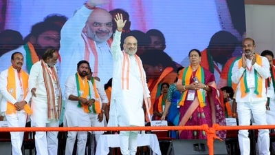 Union home minister Amit Shah acknowledges BJP social media volunteers at Secunderabad. Union home minister Amit Shah acknowledges BJP social media volunteers at Secunderabad.