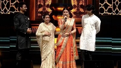 Asha Bhosle with her granddaughter Zanai Bhosle as she begins her new journey. Asha Bhosle with her granddaughter Zanai Bhosle as she begins her new journey.
