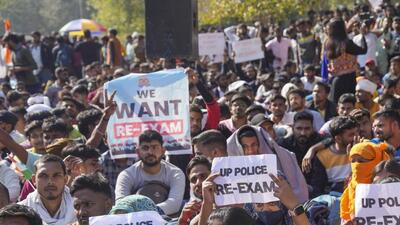 Candidates who appeared for the UP Police Constable exam stage a protest over paper leak allegations in Lucknow. On February 24, chief minister Yogi Adityanath cancelled the examination over allegations of paper leak and ordered a retest within six months. (PTI) Candidates who appeared for the UP Police Constable exam stage a protest over paper leak allegations in Lucknow. On February 24, chief minister Yogi Adityanath cancelled the examination over allegations of paper leak and ordered a retest within six months. (PTI)