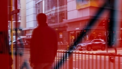 A pedestrian reflected in a sign in Hong Kong, China. (Bloomberg) A pedestrian reflected in a sign in Hong Kong, China. (Bloomberg)